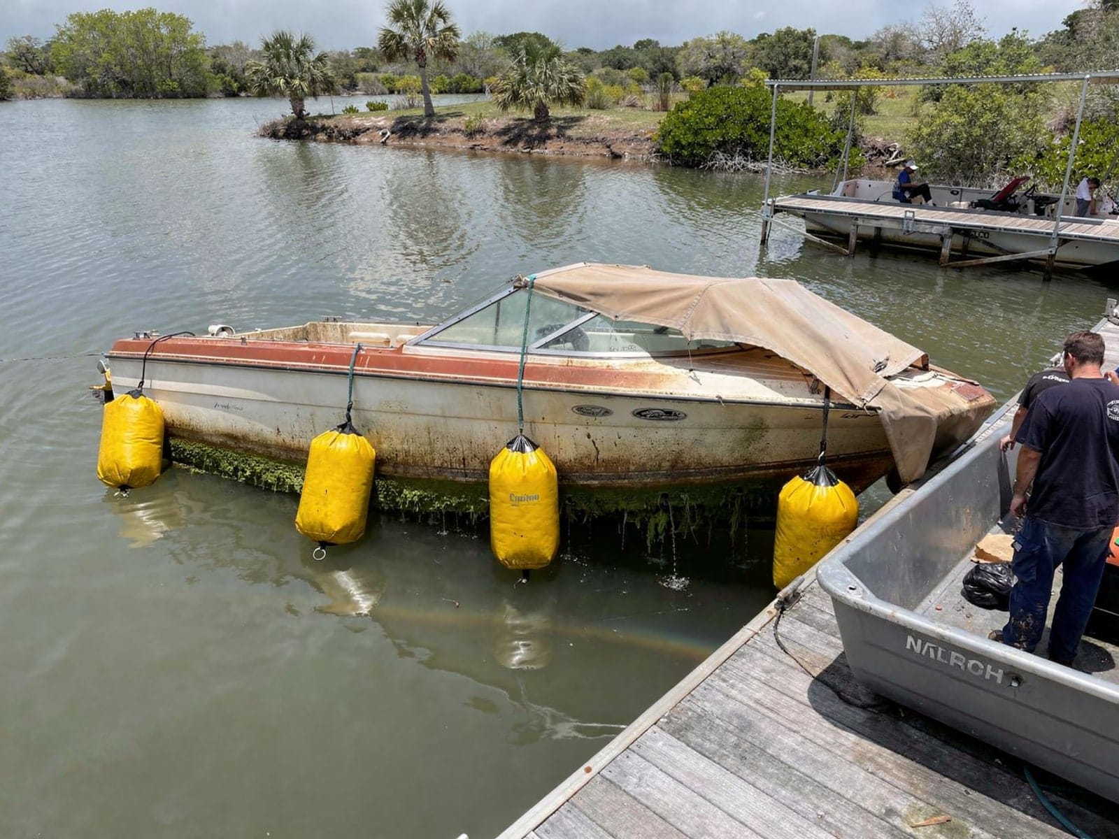 23 ft Chris-Craft Cavalier raised by lift bags in Altamonte Springs, FL