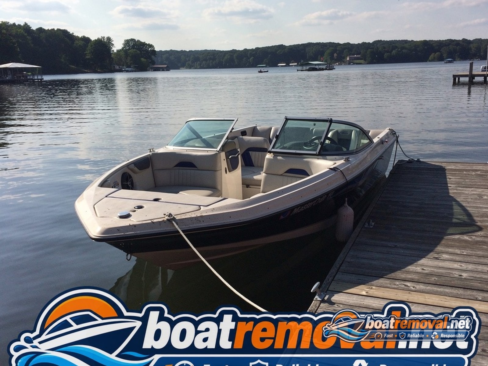 20-foot MasterCraft ski boat tied at a dock near Arnolds Park, Iowa