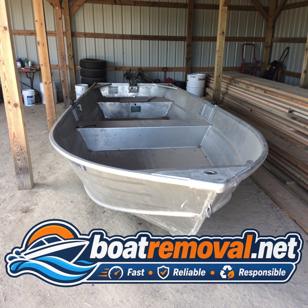 boat junkyard pickup Burlington ND, 14 ft Starcraft aluminum boat in pole barn