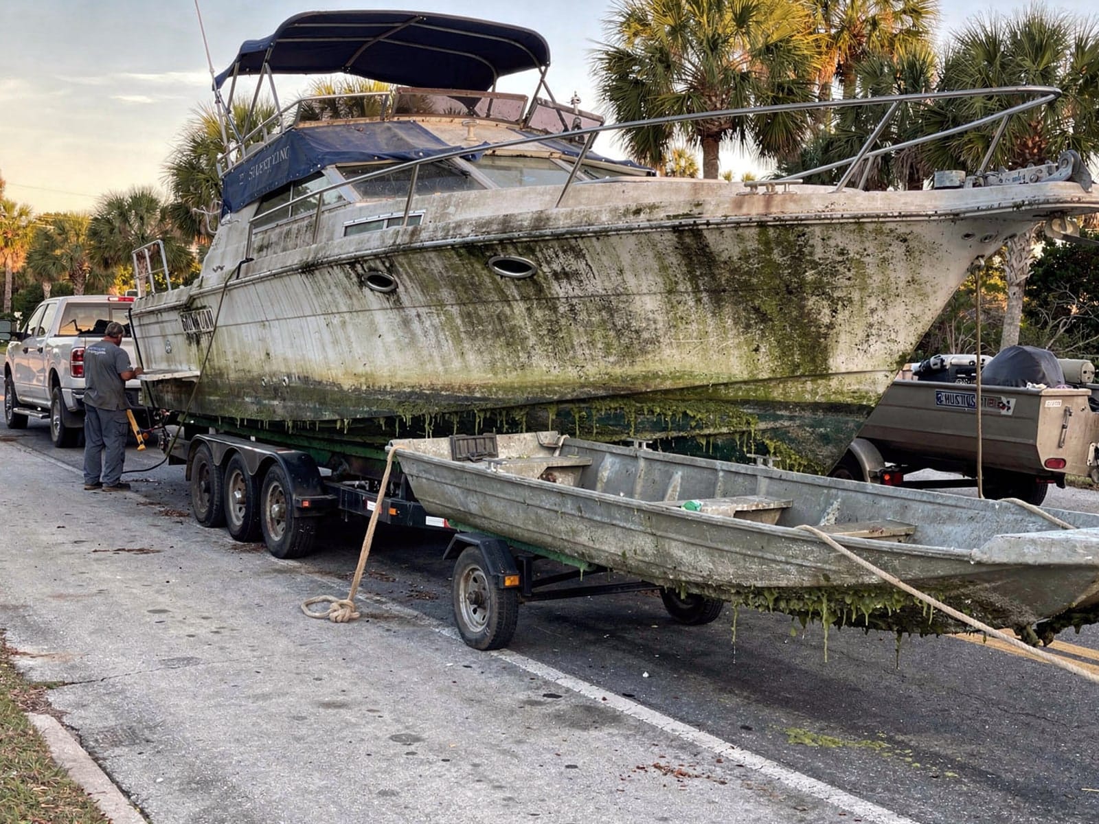 34 ft Silverton 34 hauled out of Jacksonville, FL on a trailer after the recovery