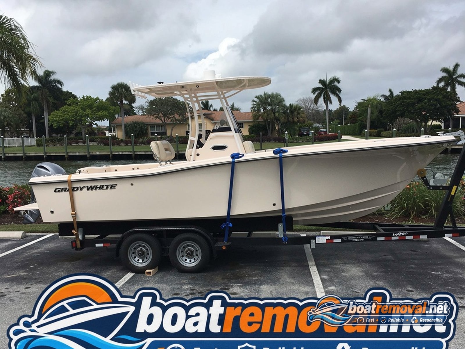 Fort Myers, FL: 23-foot Grady-White center console loaded for removal Grady-White center console loaded onto a trailer after storm removal in Fort Myers, Florida
