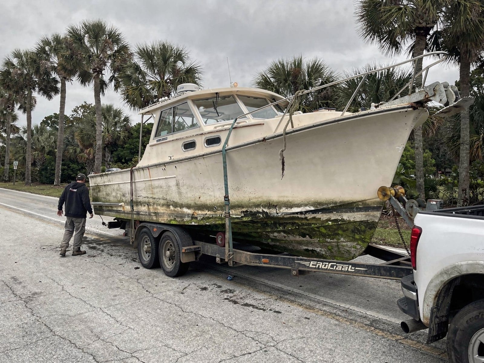 27 ft Chris-Craft Commander 27 hauled out of Pinellas Park, FL on a trailer after the recovery