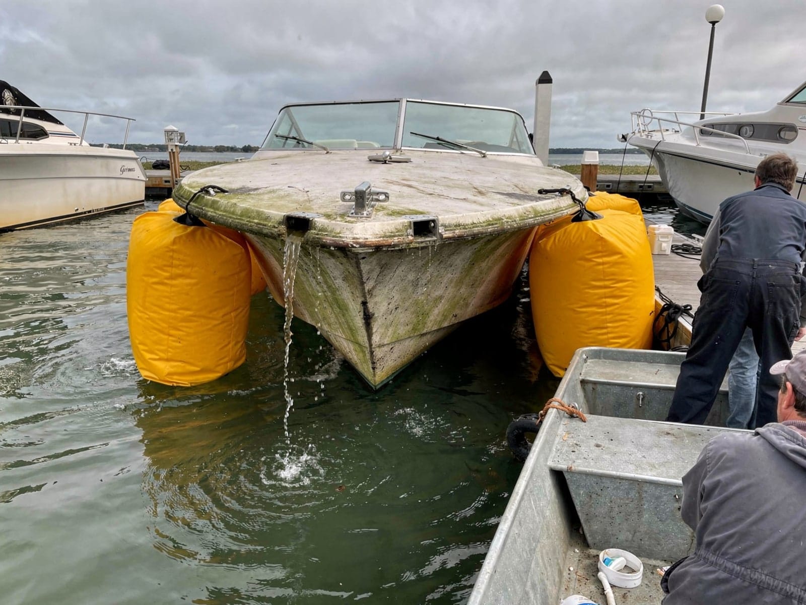 Sunken boat recovery in Boca Raton, FL: raised with lift bags 23 ft Chris-Craft Cavalier raised by lift bags in Boca Raton, FL