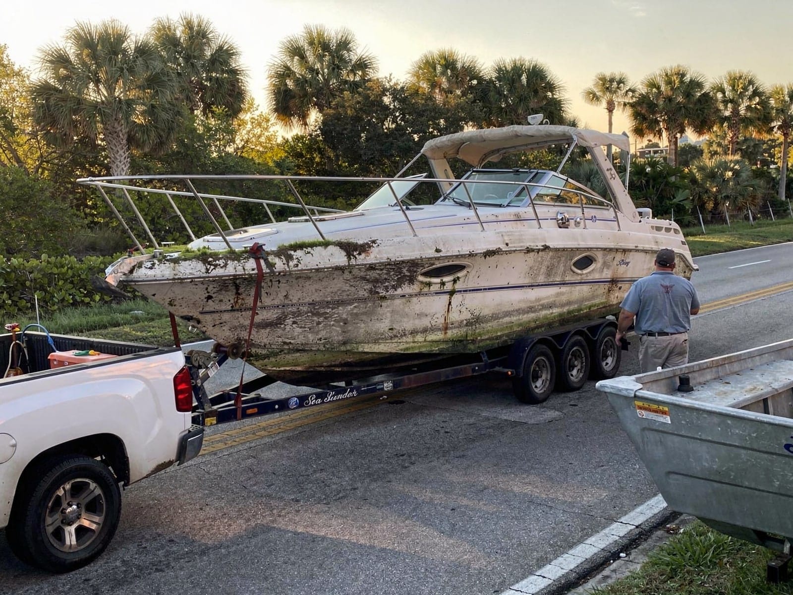 26 ft Sea Ray 268 Sundancer hauled out of New Smyrna Beach, FL on a trailer after the recovery