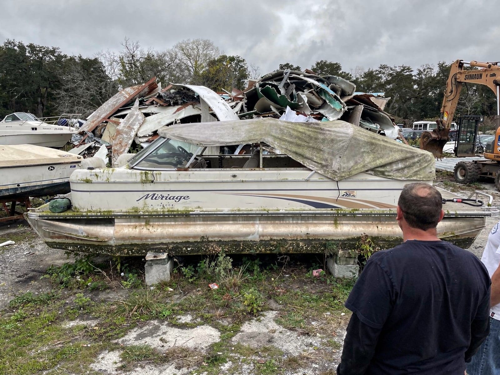 20 ft Sylvan Mirage 20 from Doctor Phillips, FL at the recycling yard after the recovery