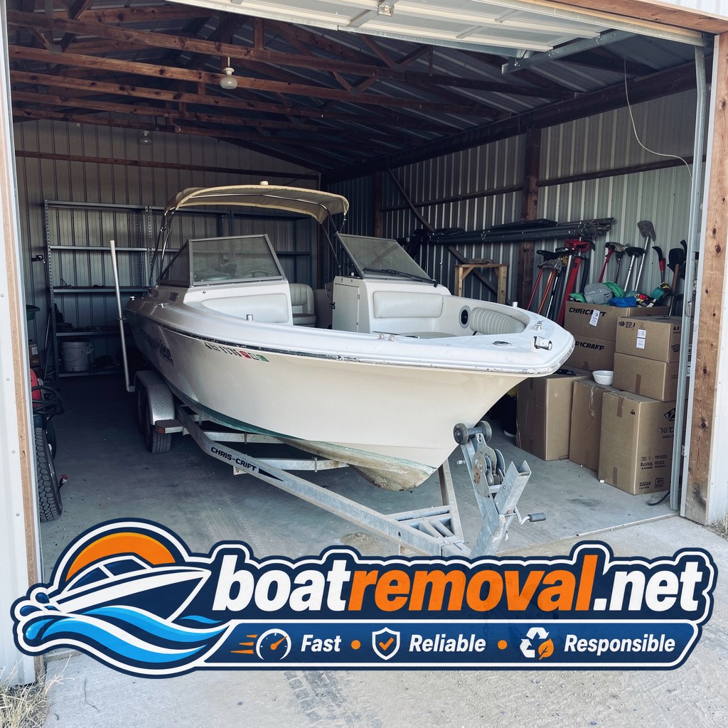 estate cleanout boat removal Sturgis SD, 23 ft Chris-Craft cabin cruiser in outbuilding