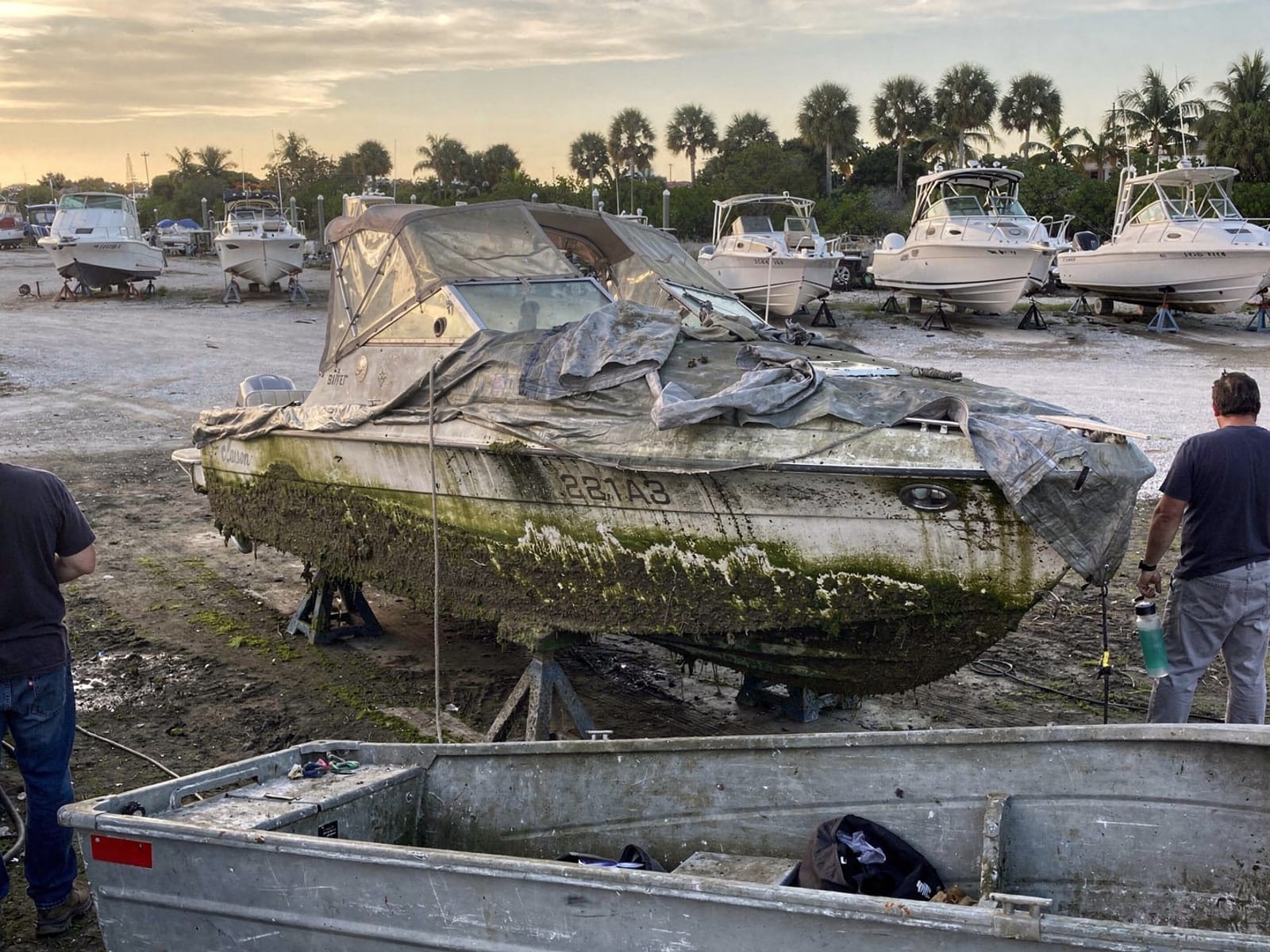 22 ft Larson 220 from Fleming Island, FL on stands at a repair yard after the recovery