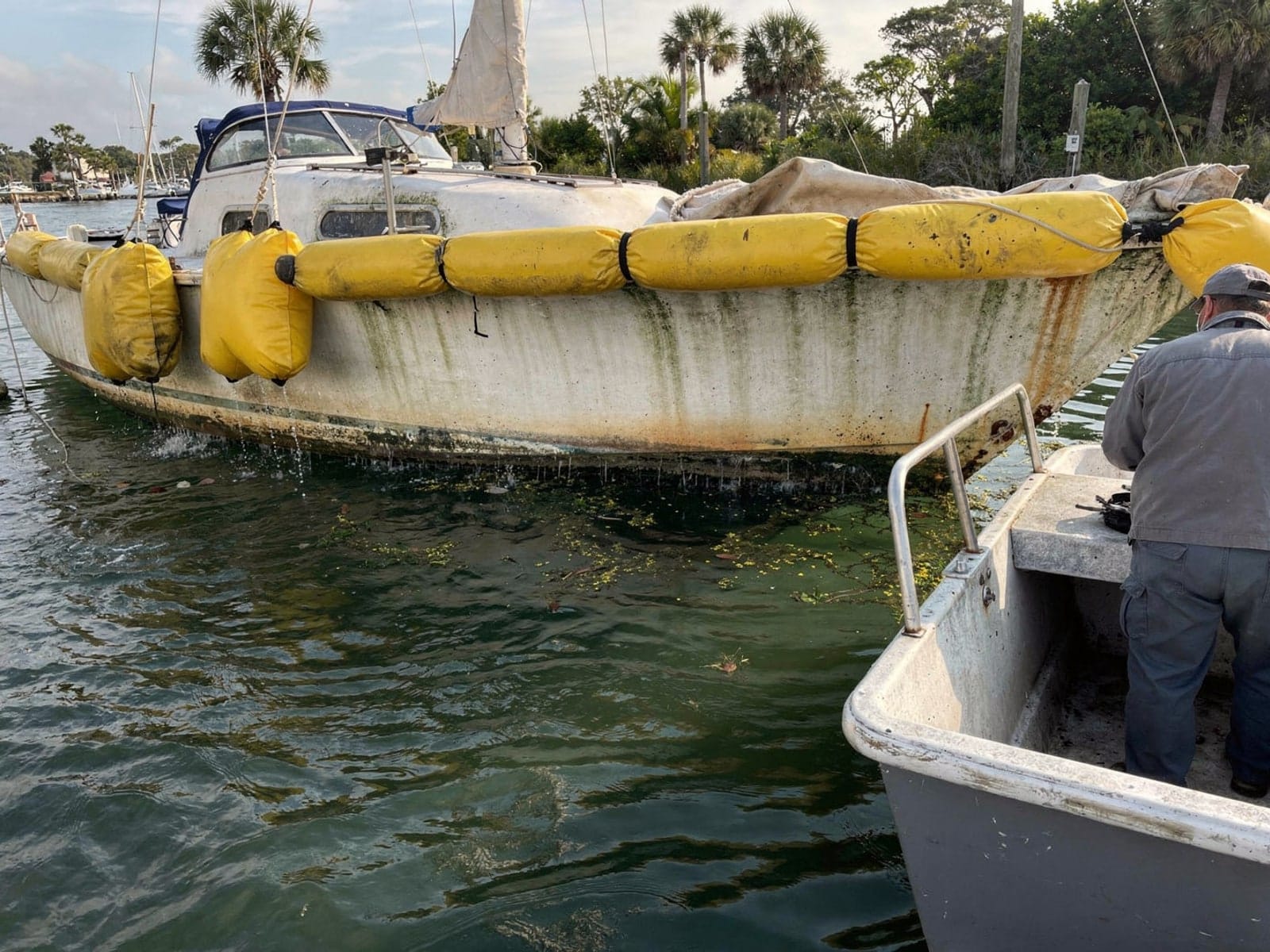 25 ft O'Day 25 from Fountainebleau, FL on stands at a repair yard after the recovery