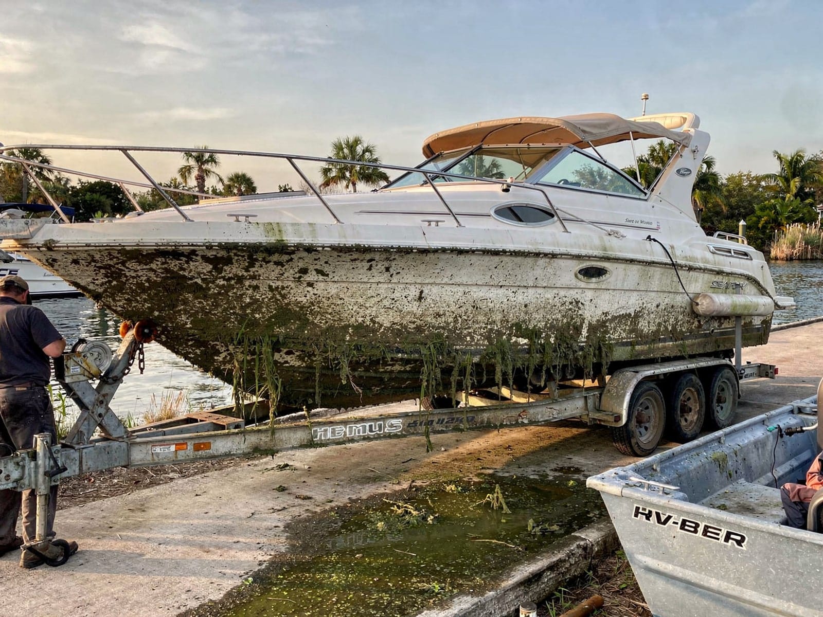 26 ft Sea Ray 268 Sundancer pulled out on a trailer at a Fruit Cove, FL boat ramp