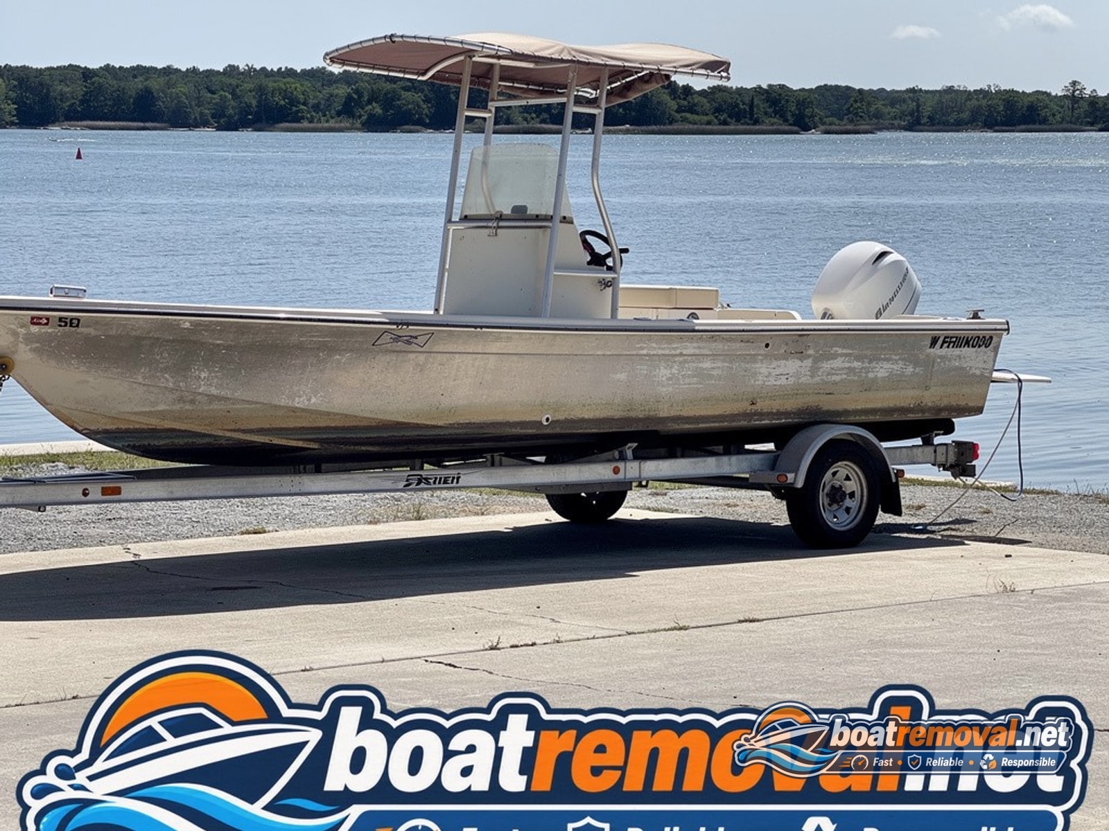 Gloucester Point, VA: 23-foot Grady-White center console loaded for removal Same center console boat loaded onto a trailer at a boat ramp