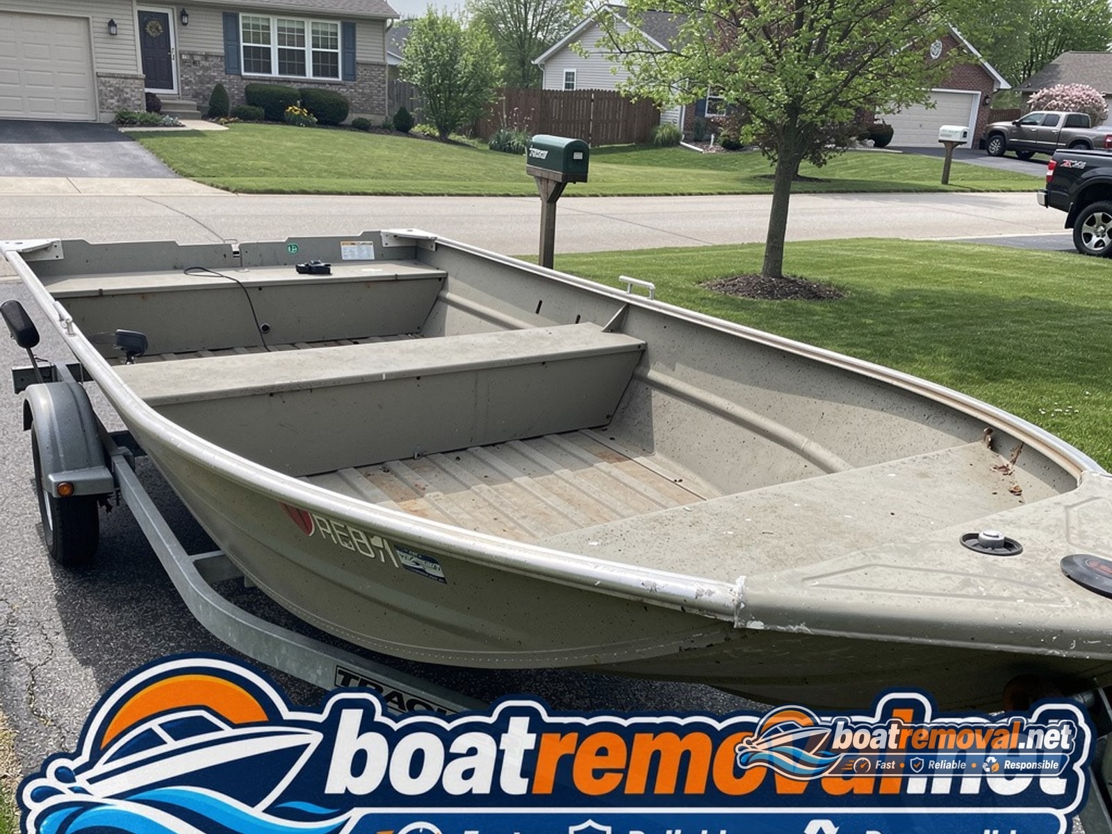 boat disposal Grove City OH, 17 ft Tracker aluminum bass boat in driveway