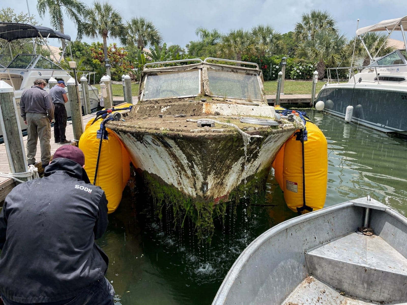 21 ft Thompson 21 raised by lift bags in Pompano Beach, FL