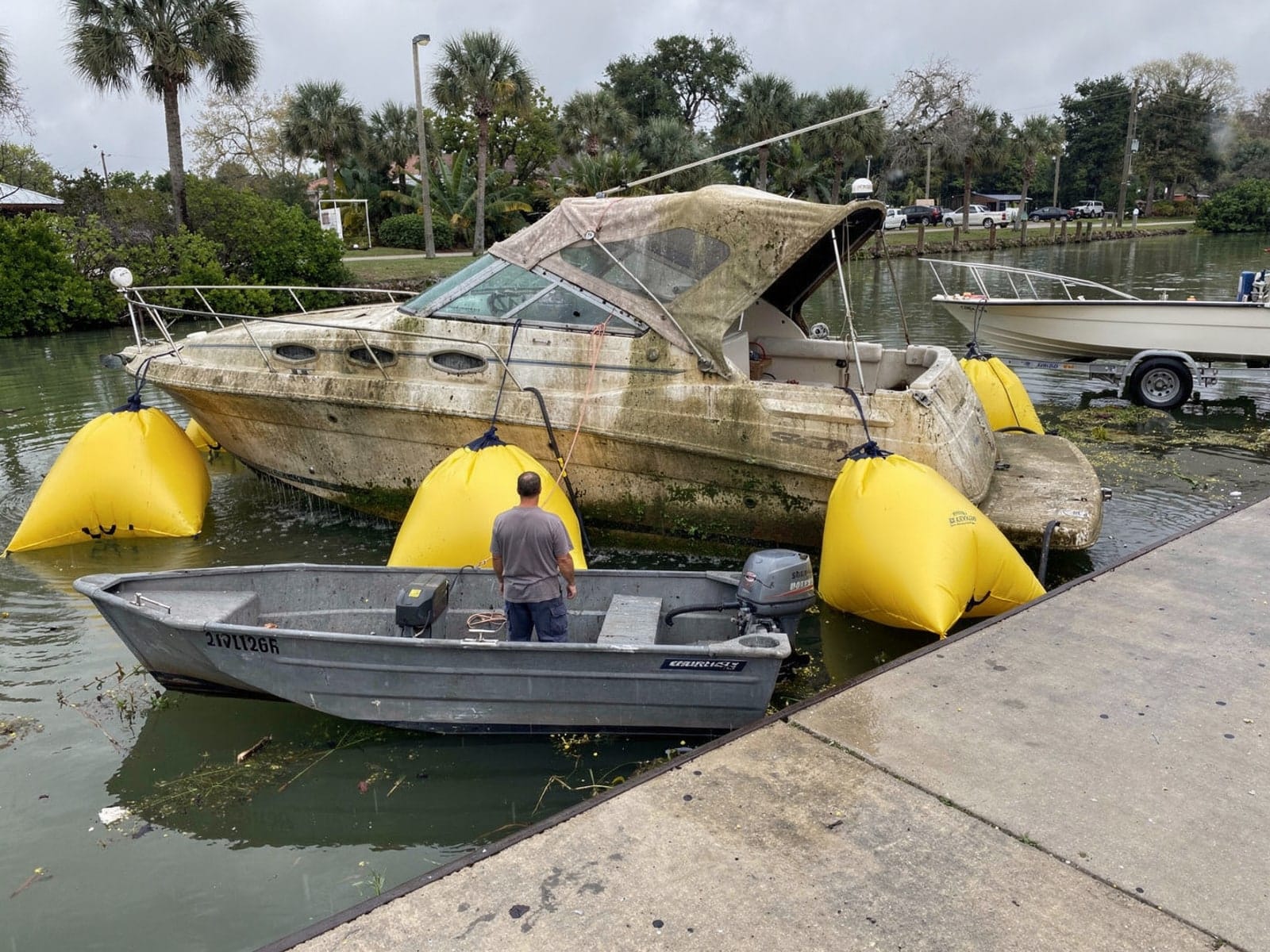 26 ft Sea Ray 268 Sundancer raised by lift bags in Silver Springs Shores, FL