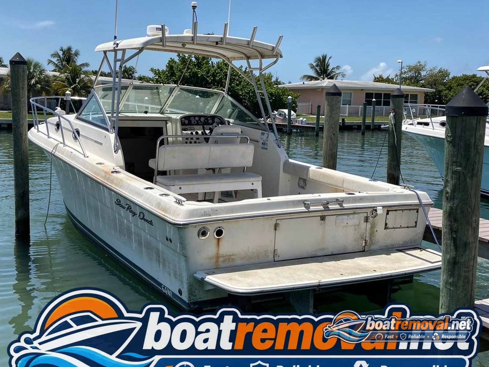 31-foot Sea Ray sportfisher missing both engines tied up in a marina slip in Islamorada, Florida