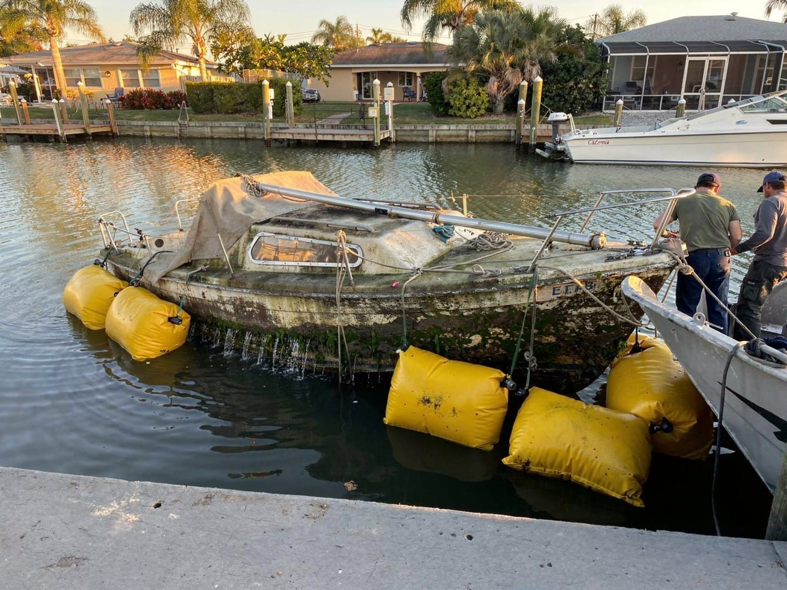 22 ft Catalina 22 raised by lift bags in Jacksonville Beach, FL