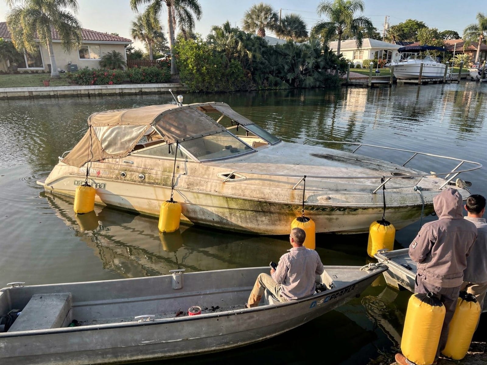 Sunken boat recovery in Kendale Lakes, FL: raised with lift bags 24 ft Formula 242 raised by lift bags in Kendale Lakes, FL