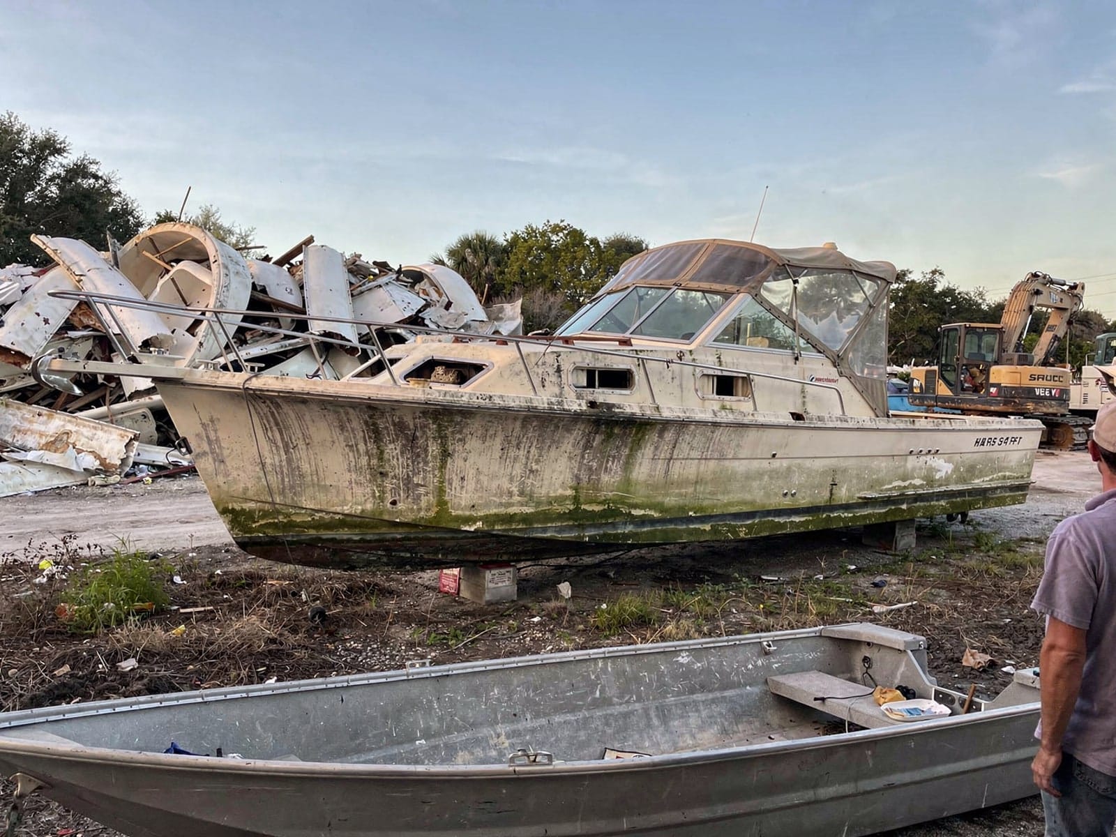 27 ft Chris-Craft Commander 27 from Kendall West, FL at the recycling yard after the recovery