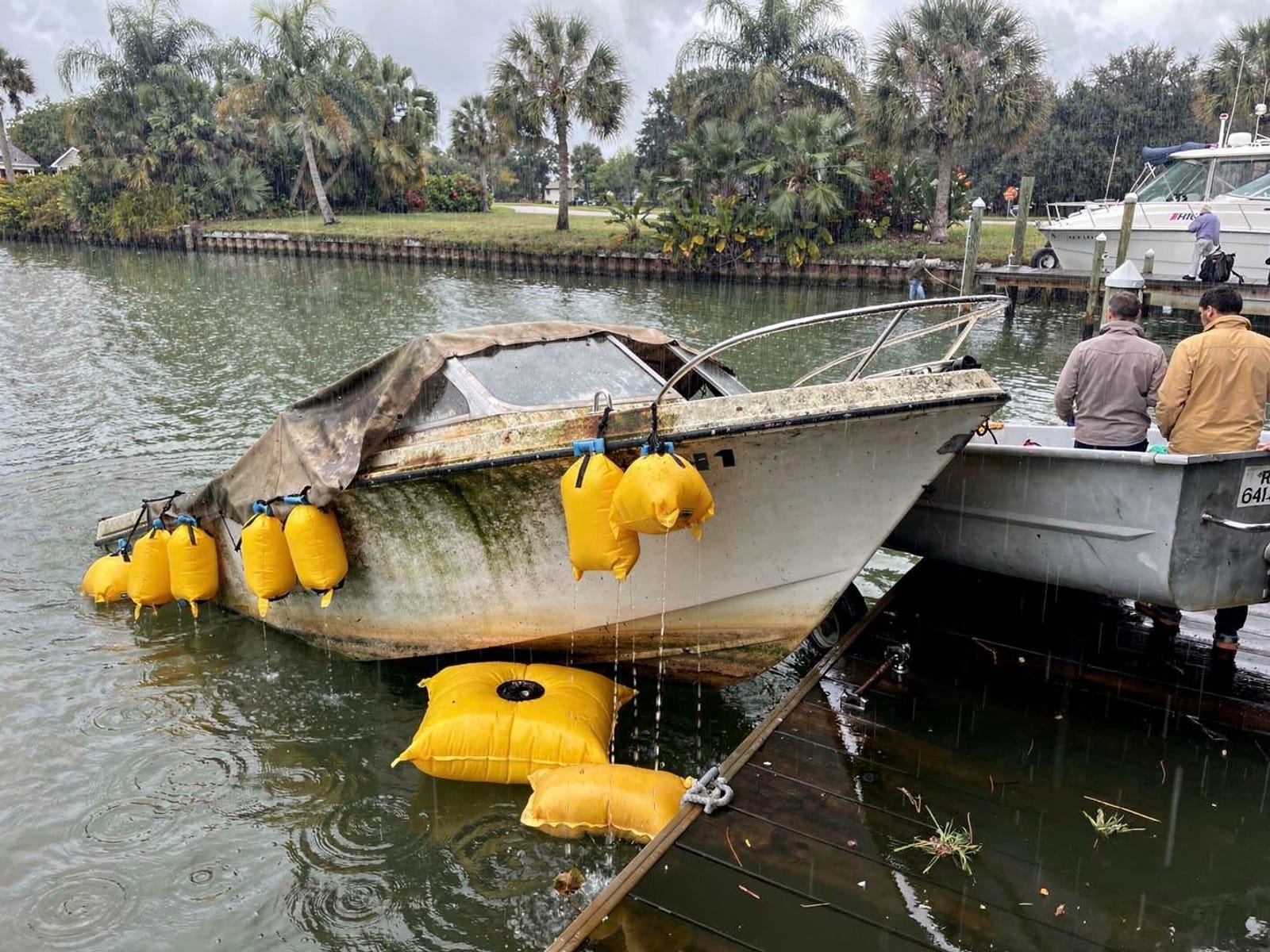 21 ft Thompson 21 raised by lift bags in Keystone, FL