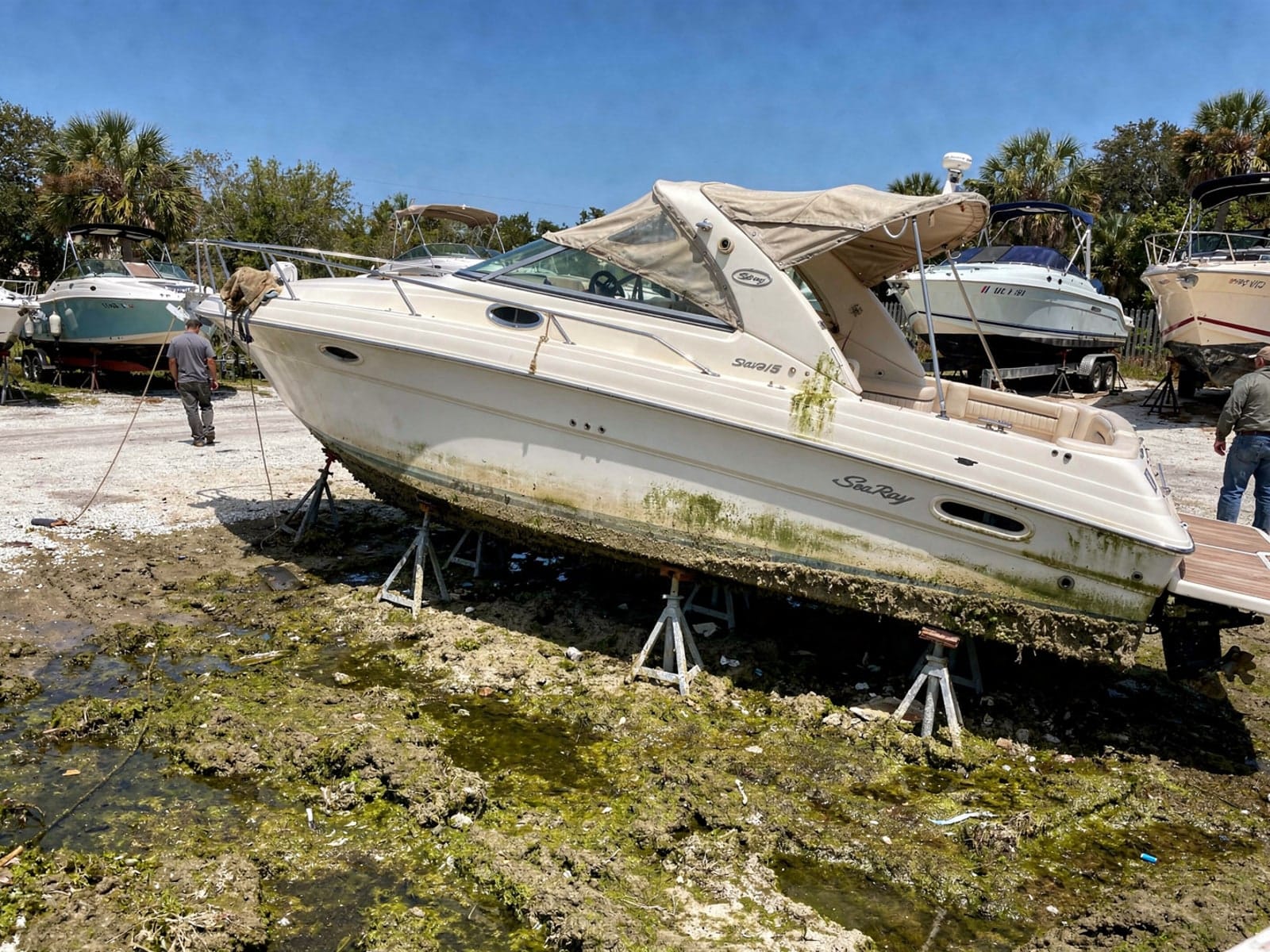26 ft Sea Ray 268 Sundancer from Lake Mary, FL on stands at a repair yard after the recovery