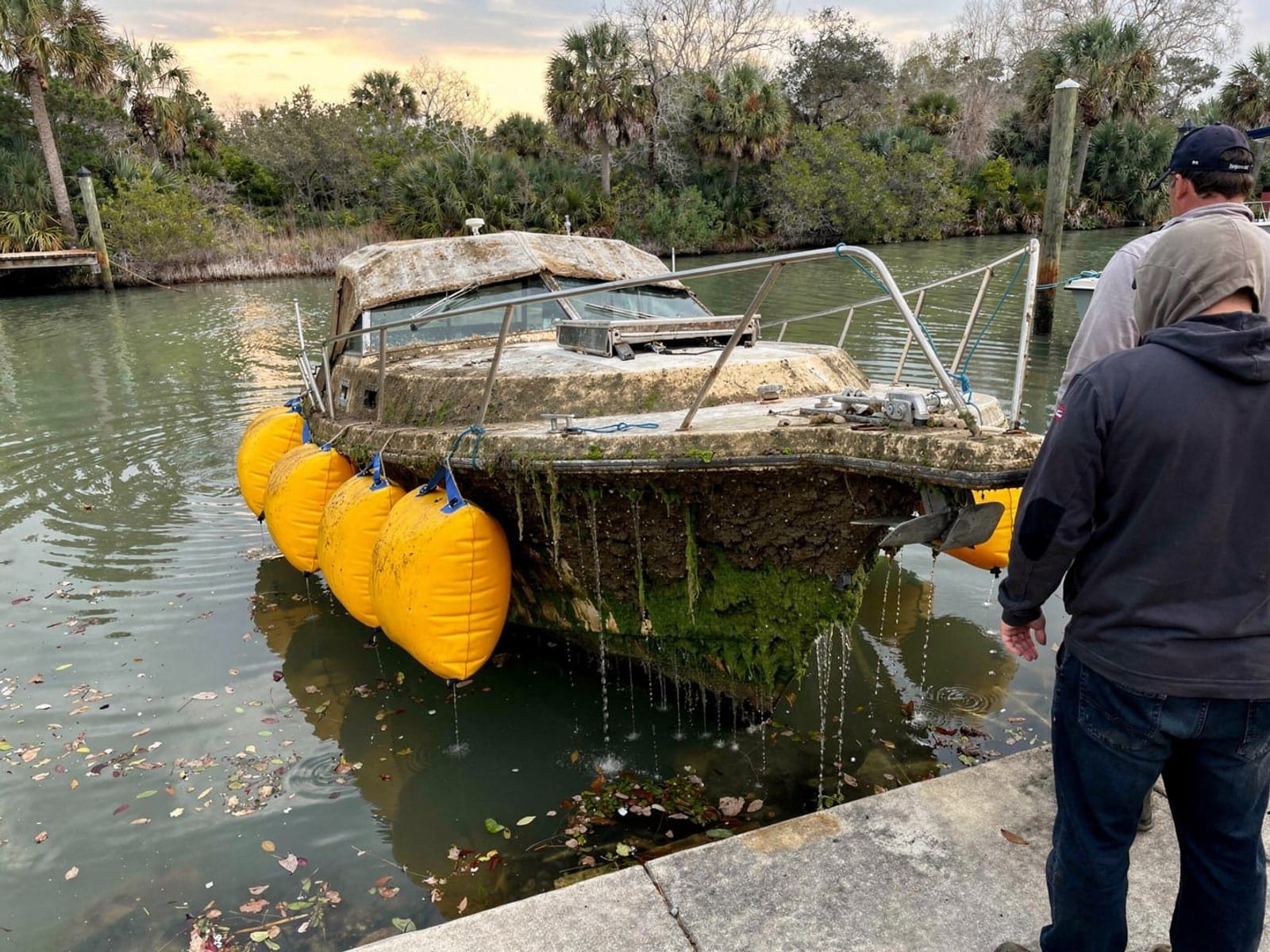 28 ft Bertram 28 raised by lift bags in Pensacola, FL