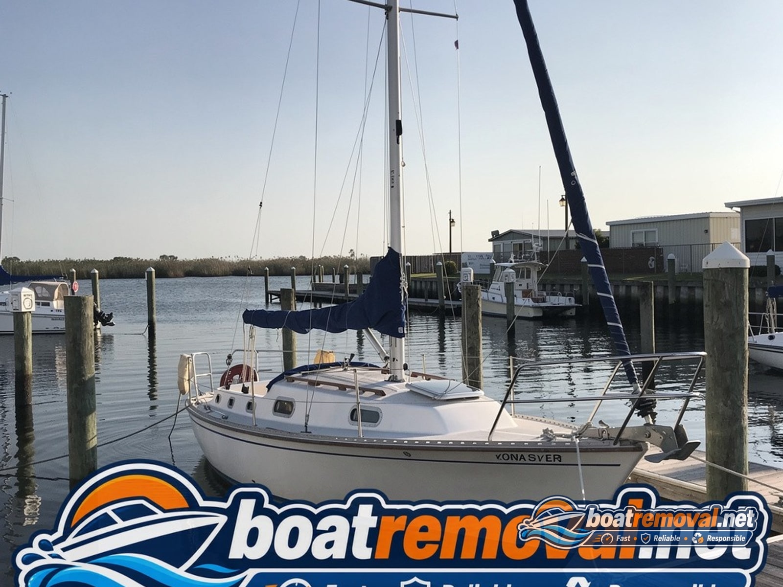 27-foot Catalina sailboat tied up in a marina slip near Metairie, Louisiana