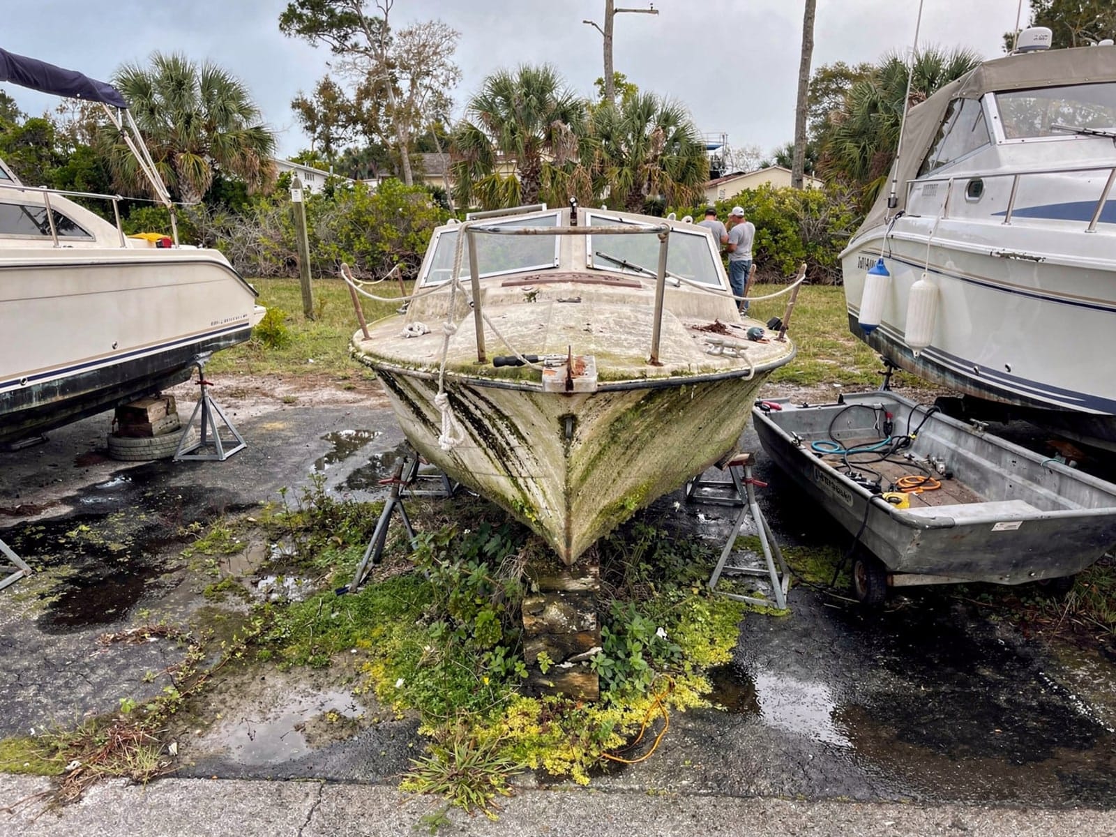 22 ft Catalina 22 from Miami, FL on stands at a repair yard after the recovery