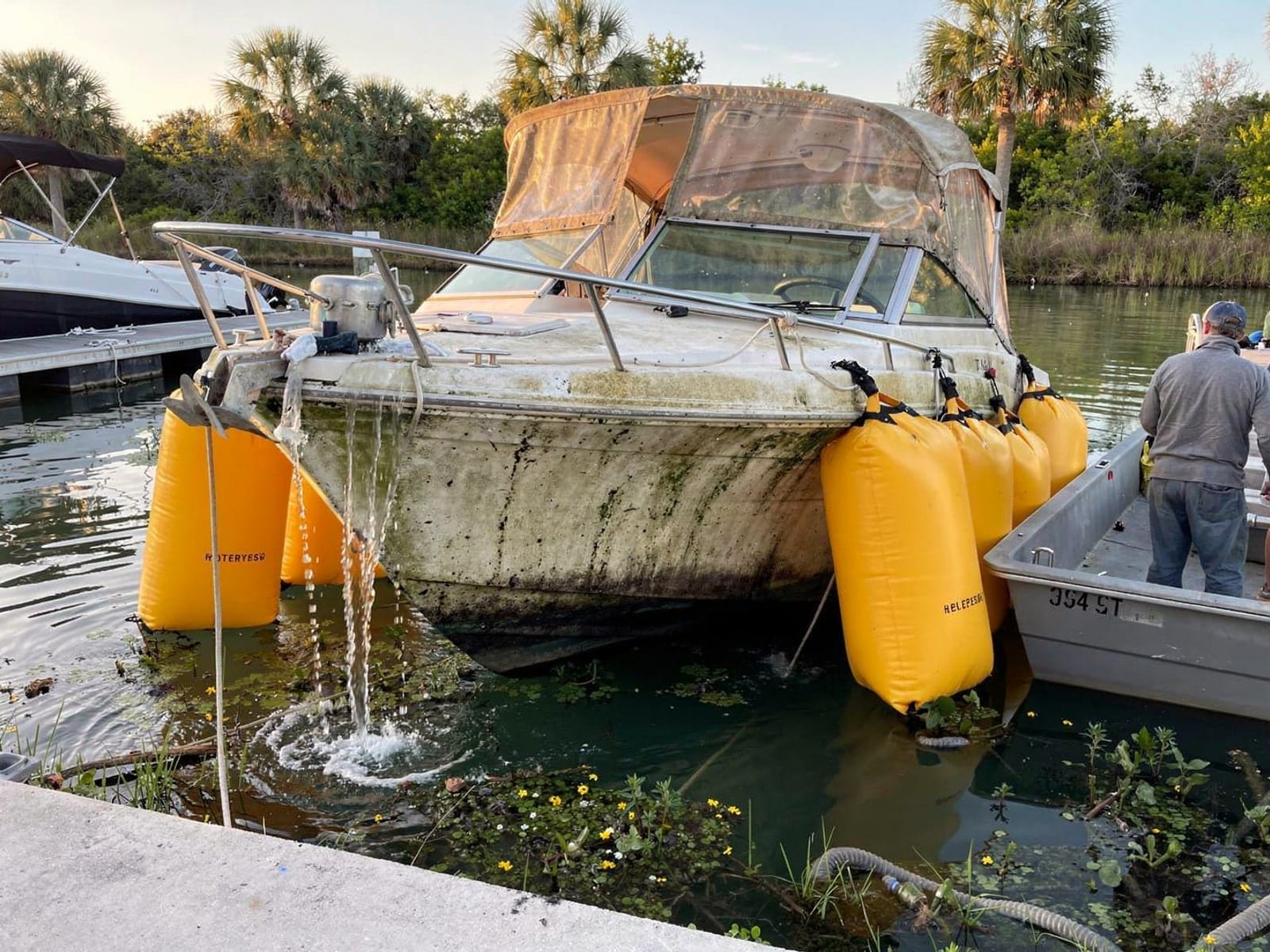 Sunken boat recovery in New Port Richey, FL: raised with lift bags 24 ft Formula 242 raised by lift bags in New Port Richey, FL