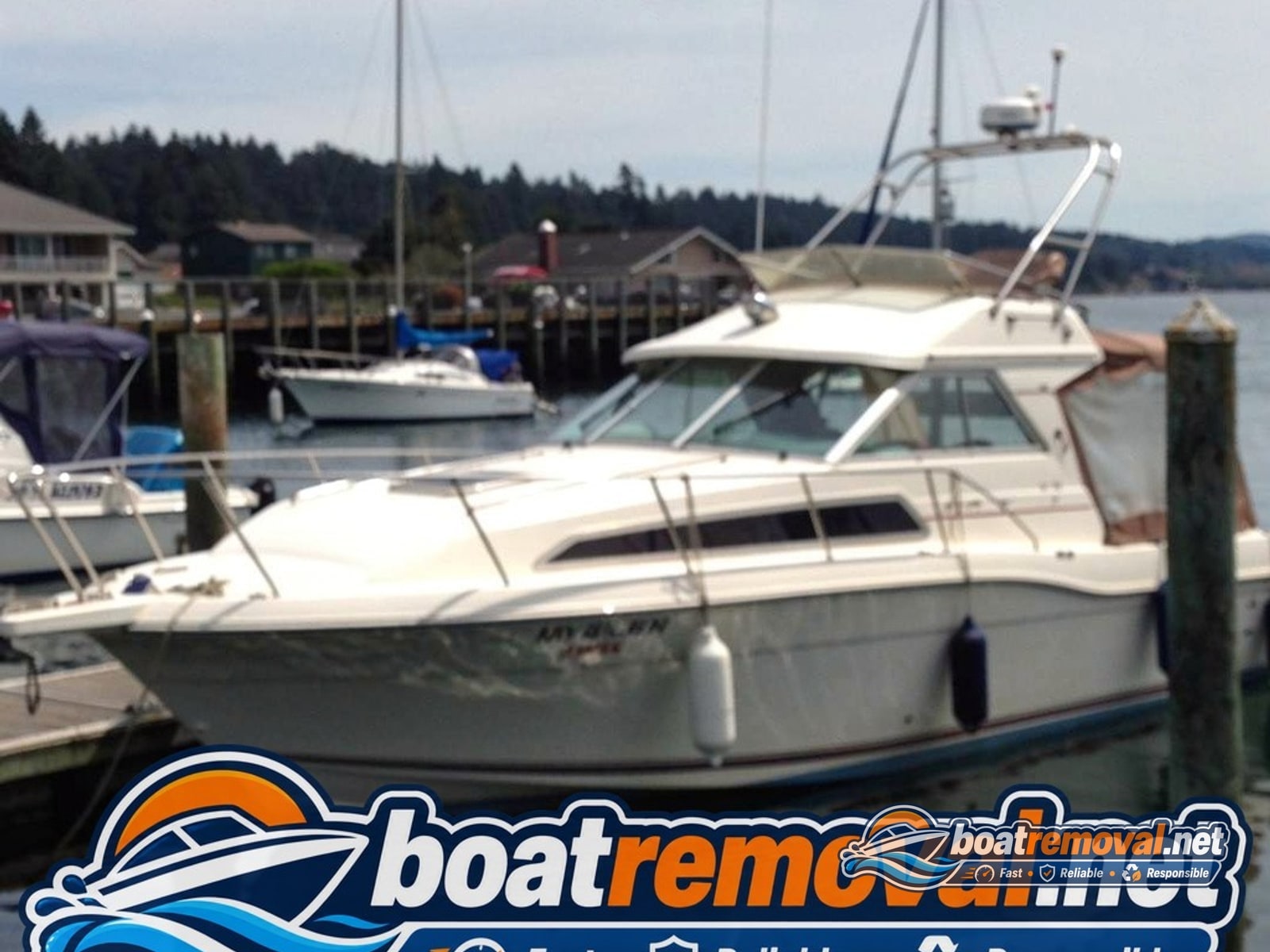 marina boat removal Newport OR, 30 ft Bayliner cabin cruiser in slip