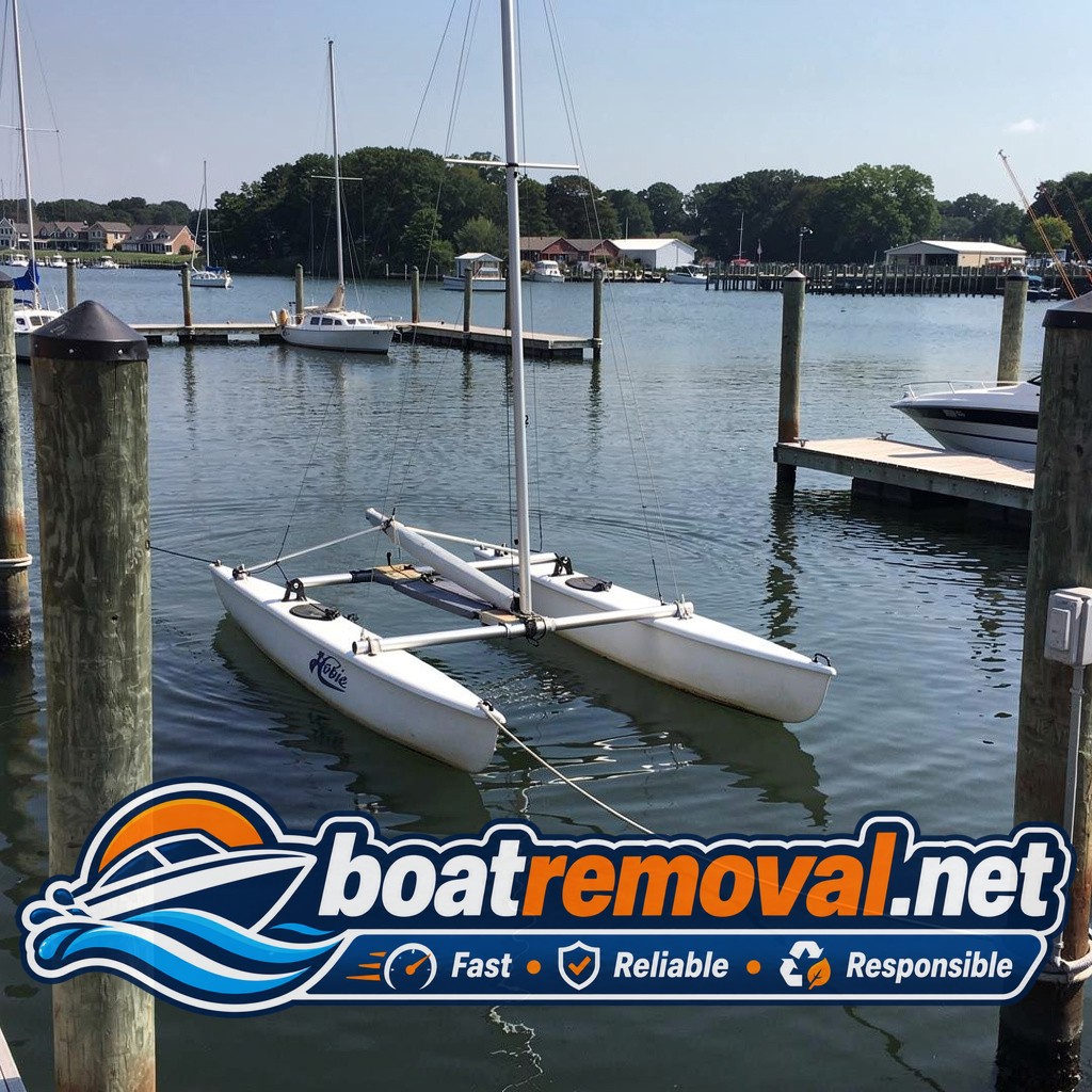 16-foot Hobie catamaran resting in a marina slip near Pasadena, Maryland