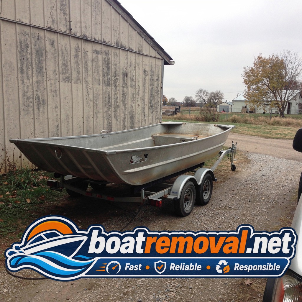 Same aluminum jon boat loaded onto the removal trailer leaving the Plattsmouth property
