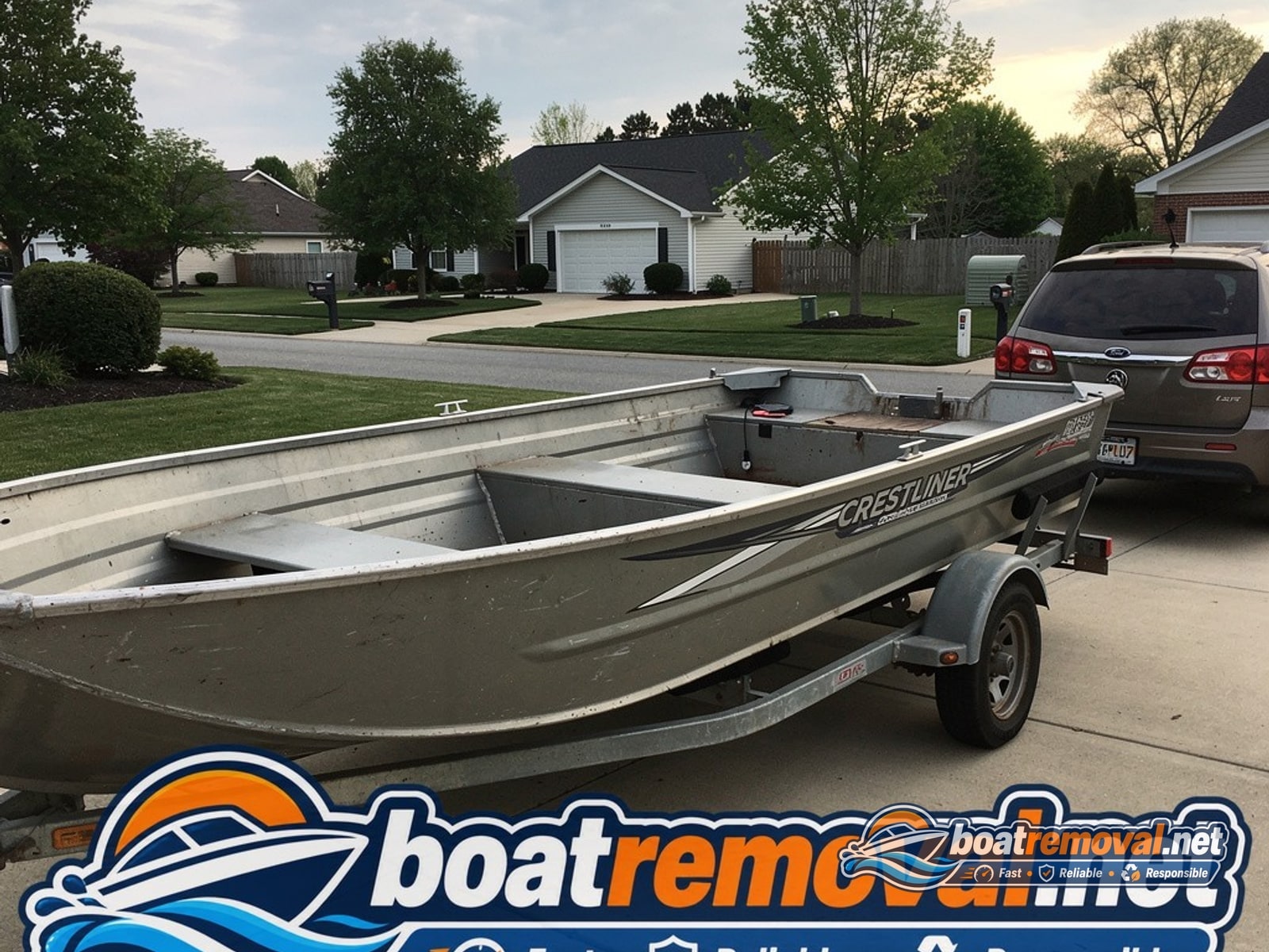 16-foot Crestliner aluminum fishing boat sitting uncovered in a driveway in Smyrna, Delaware