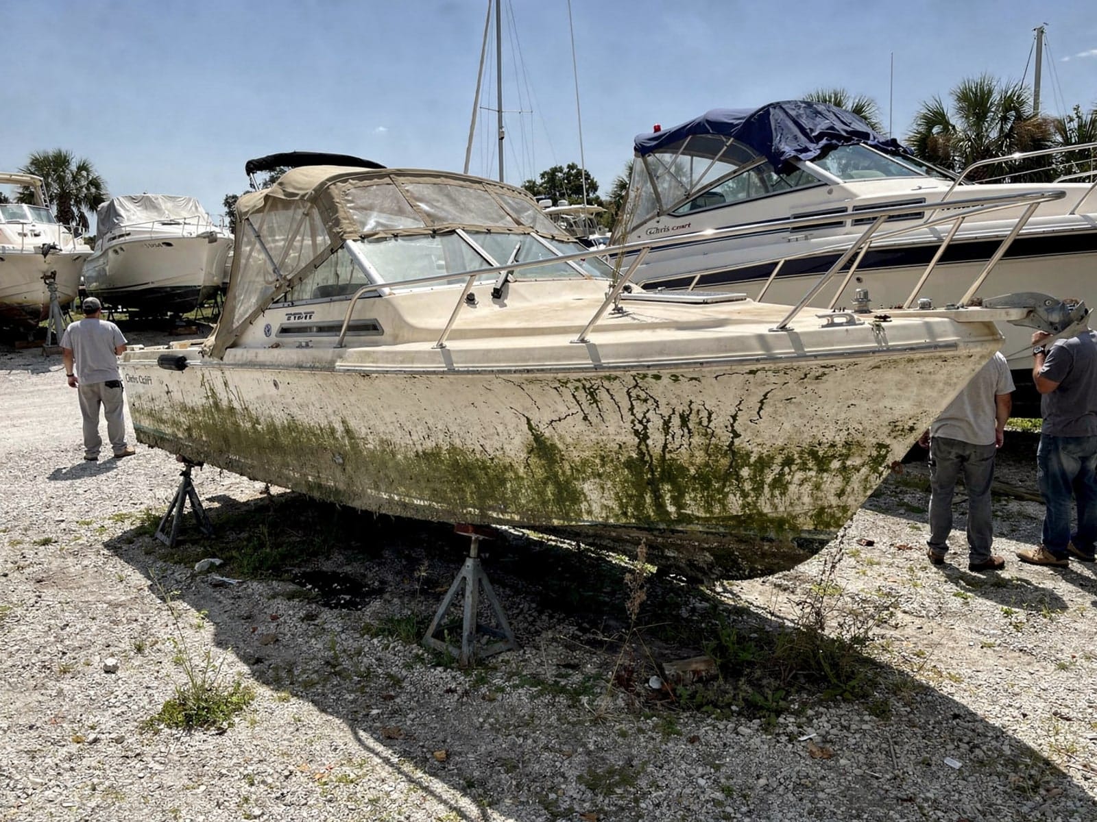 23 ft Chris-Craft Cavalier from Southchase, FL on stands at a repair yard after the recovery