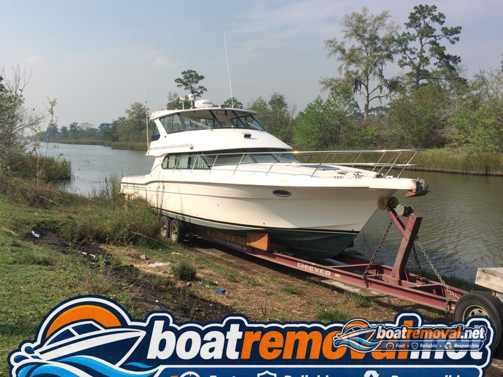 Houma, LA: 34-foot Carver motoryacht loaded for removal Carver motoryacht loaded onto a heavy trailer after storm damage removal near Houma, Louisiana
