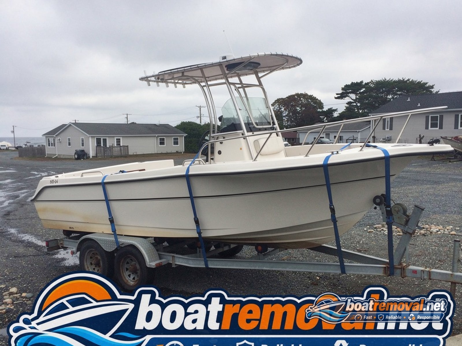 Narragansett, RI: 24 ft Wellcraft center console loaded for removal 24 ft Wellcraft center console loaded after storm damage, Narragansett Rhode Island