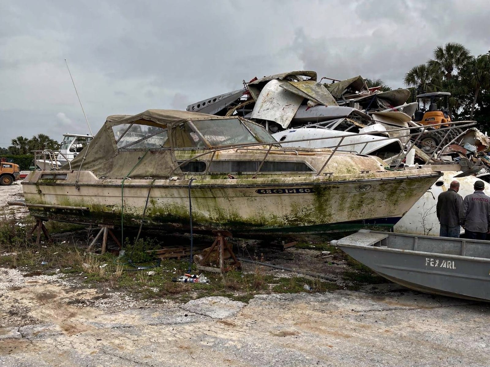 27 ft Chris-Craft Commander 27 from Town N Country, FL at the recycling yard after the recovery
