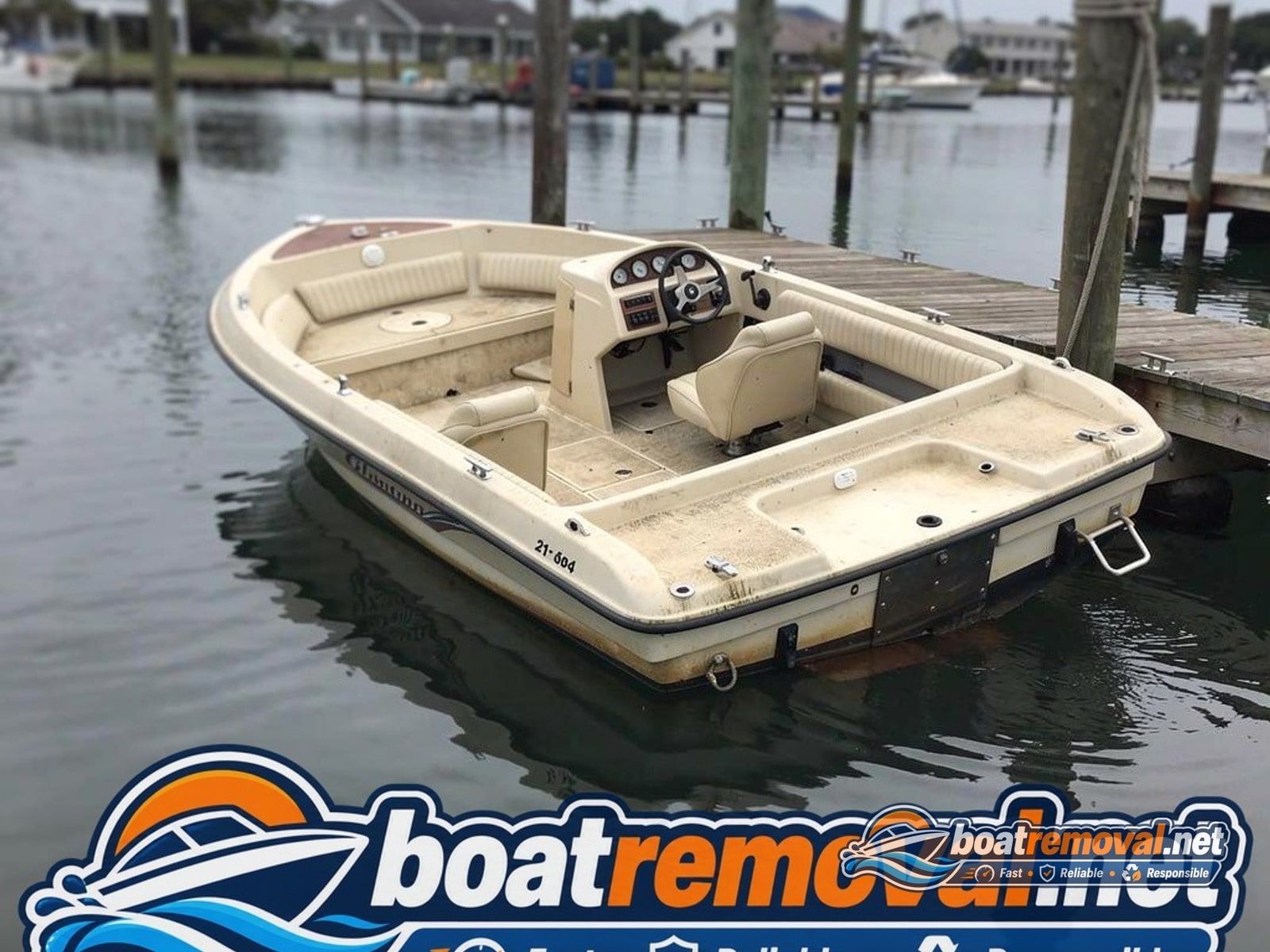 sunken boat removal Southport NC, 21 ft Glastron runabout partially submerged