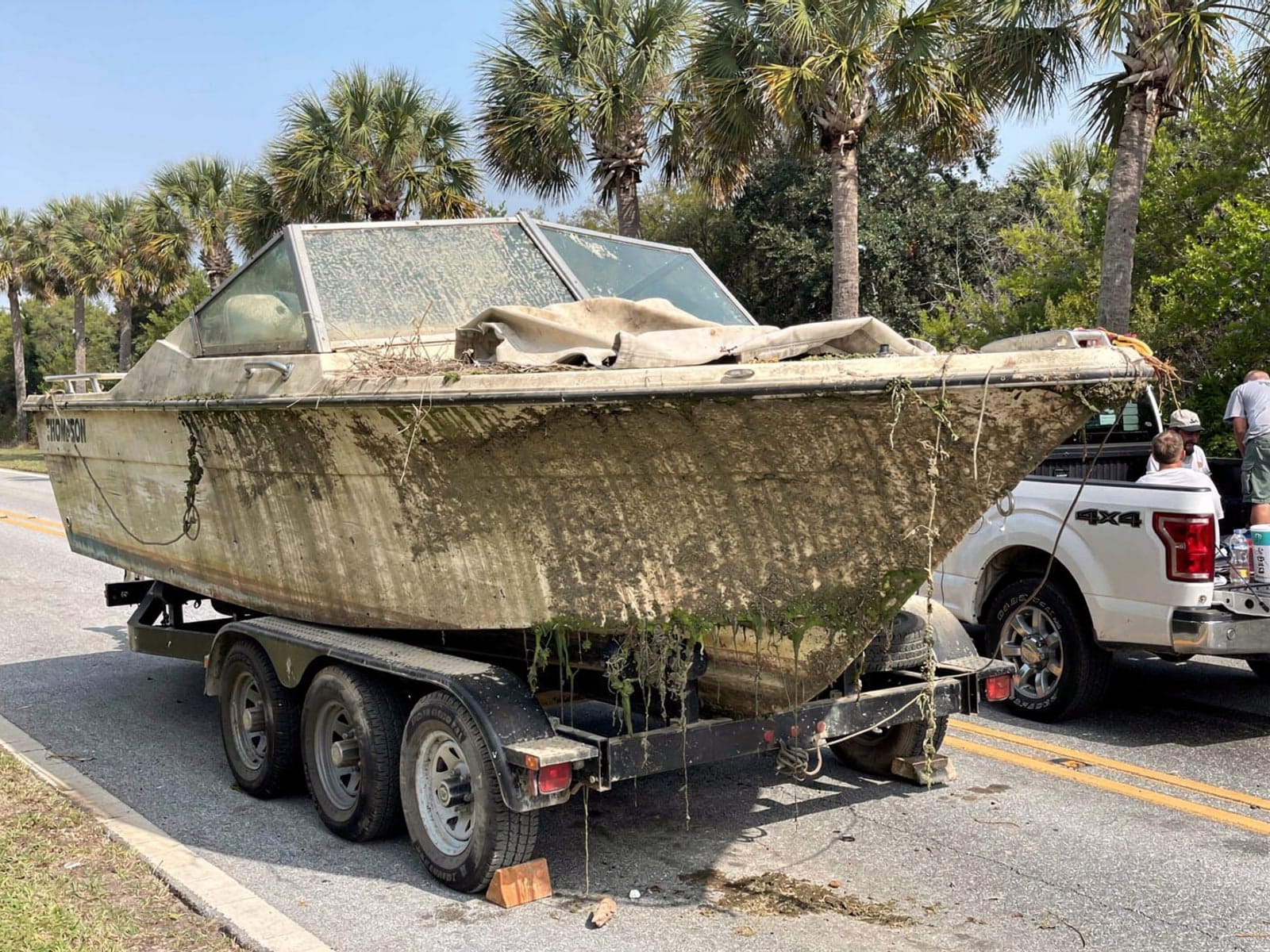 21 ft Thompson 21 hauled out of Kissimmee, FL on a trailer after the recovery