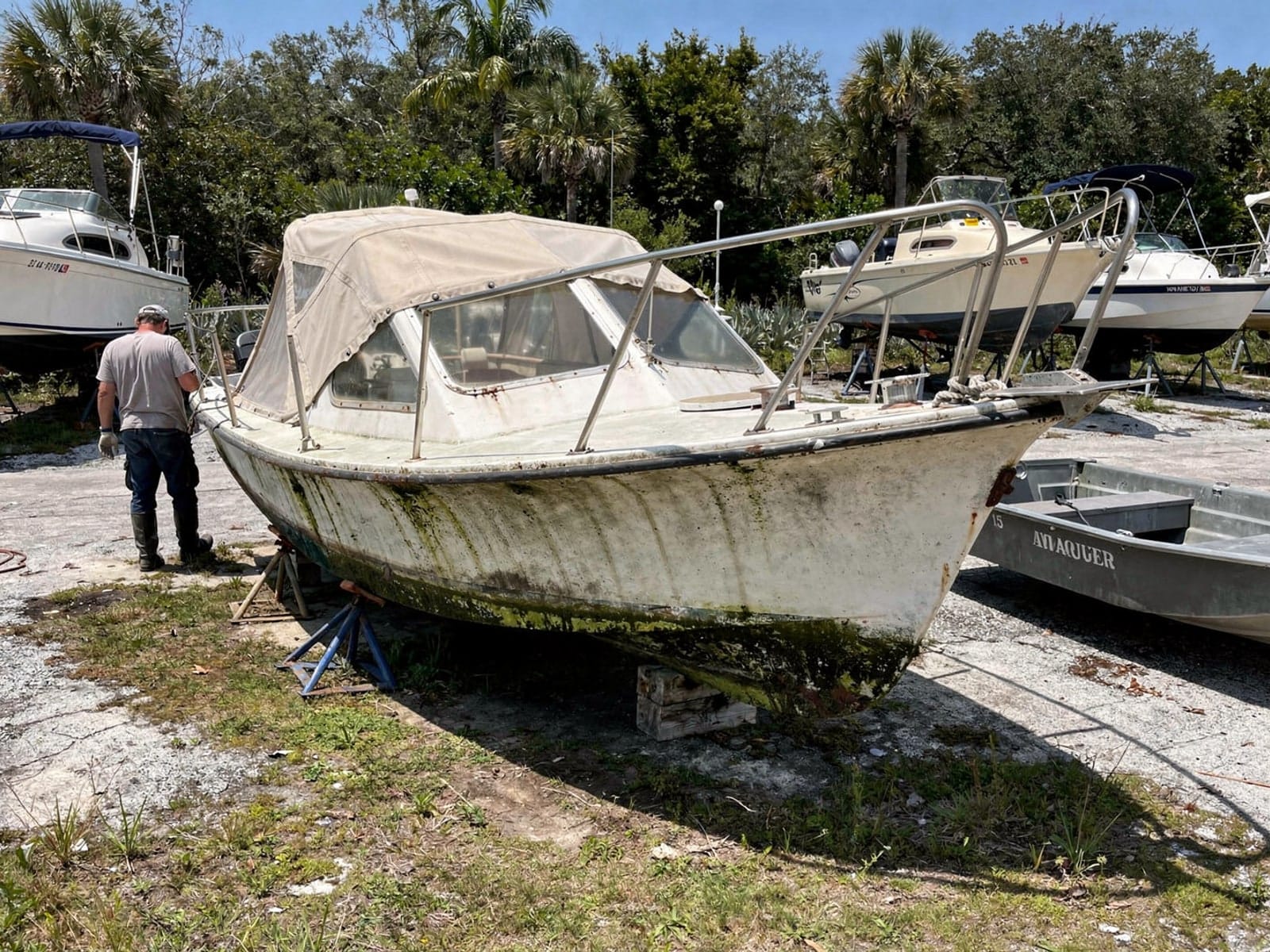 25 ft O'Day 25 from North Port, FL on stands at a repair yard after the recovery