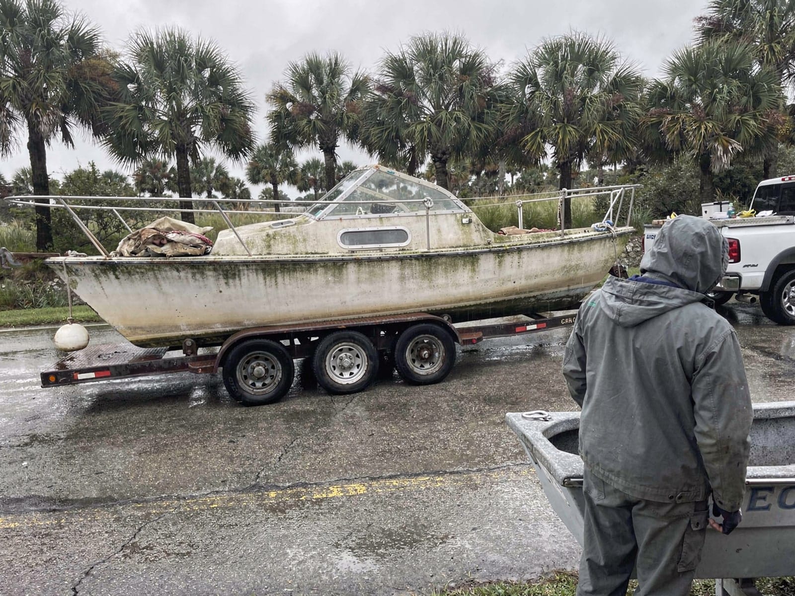 27 ft Cal 27 hauled out of Pace, FL on a trailer after the recovery