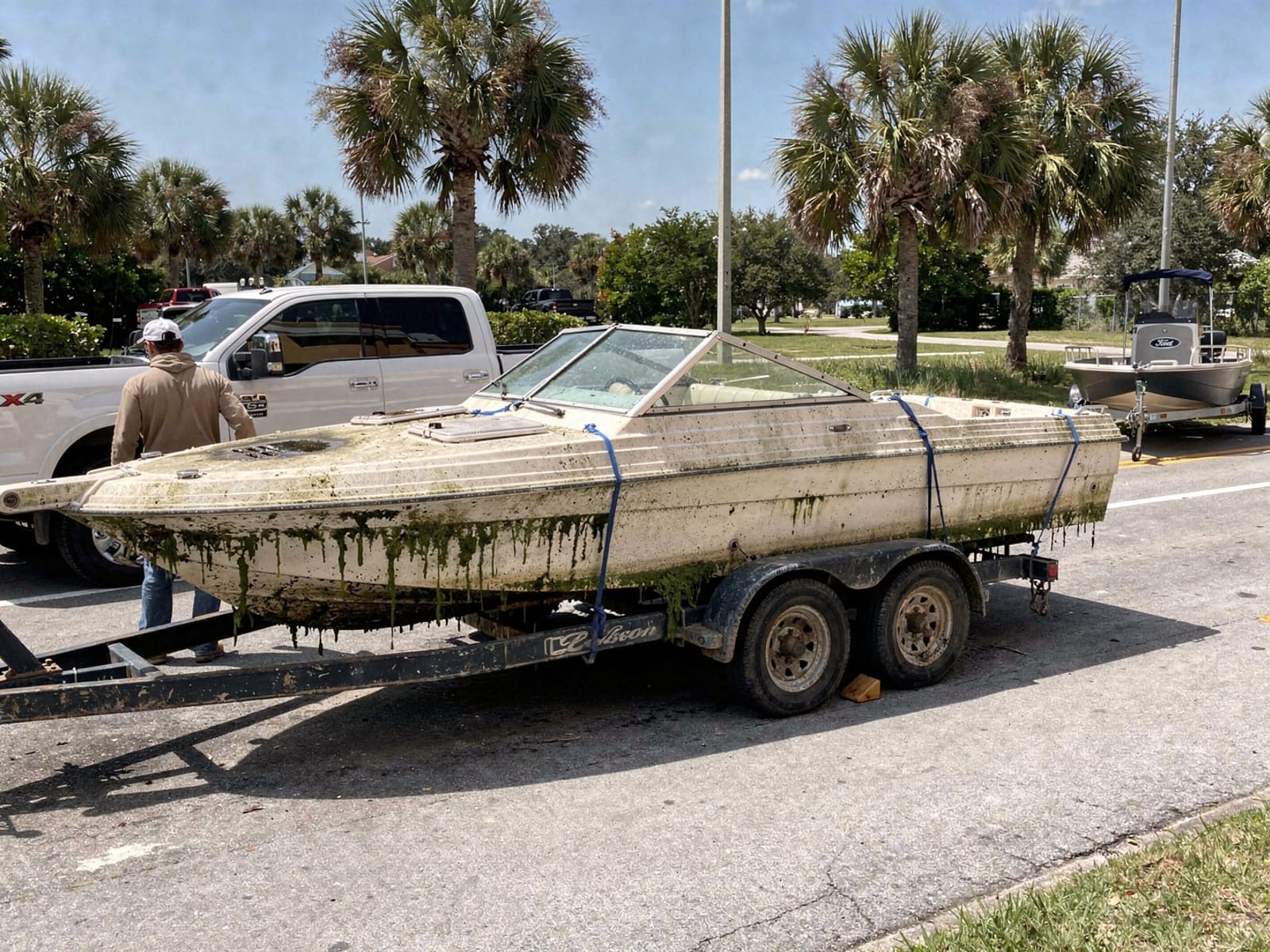 22 ft Larson 220 hauled out of Spring Hill, FL on a trailer after the recovery