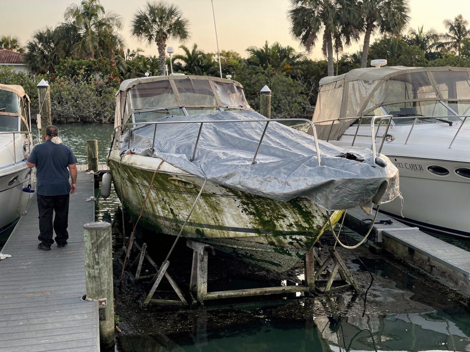 28 ft Carver 28 from Wellington, FL on stands at a repair yard after the recovery