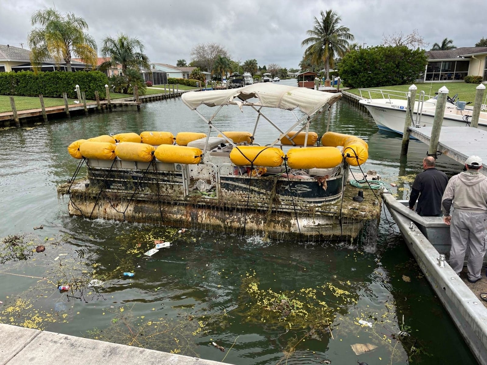 20 ft Sylvan Mirage 20 raised by lift bags in Westview, FL