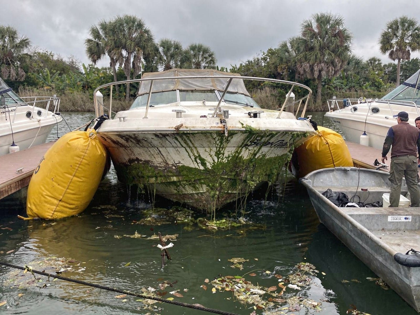 26 ft Sea Ray 268 Sundancer raised by lift bags in The Hammocks, FL