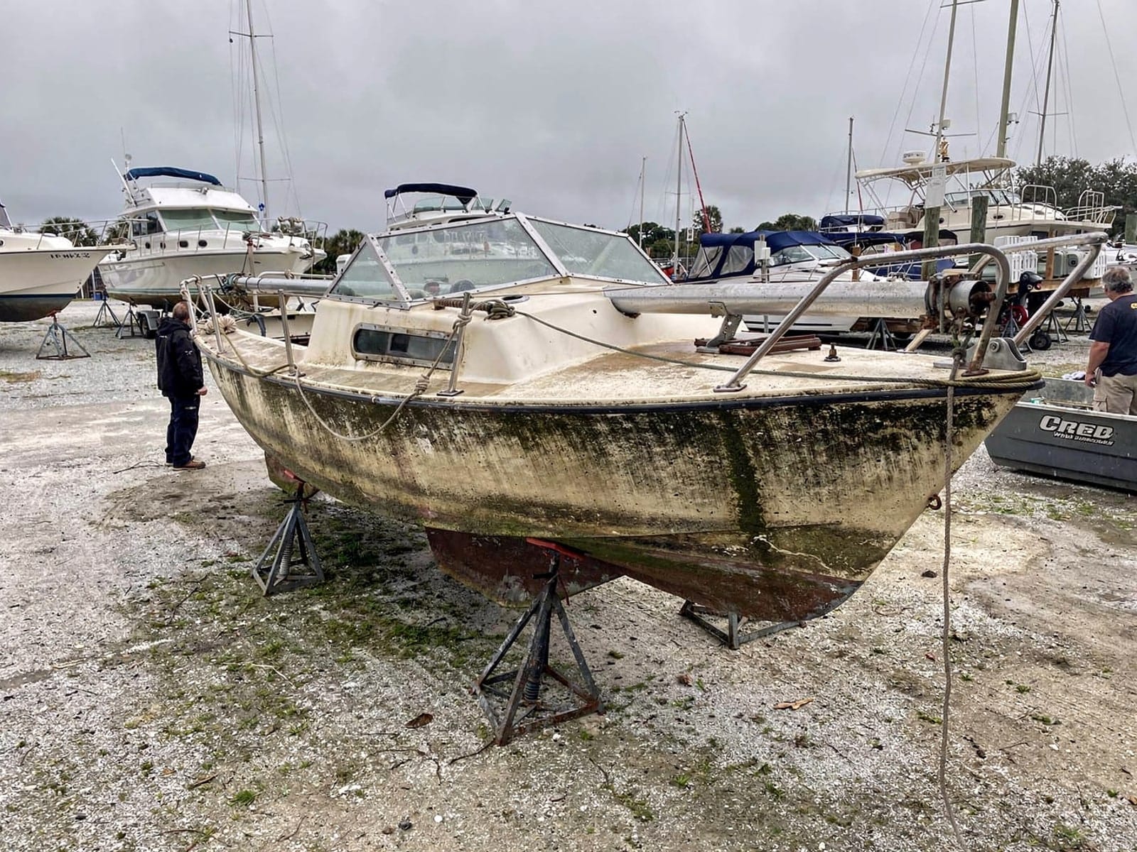22 ft Catalina 22 from Westwood Lakes, FL on stands at a repair yard after the recovery