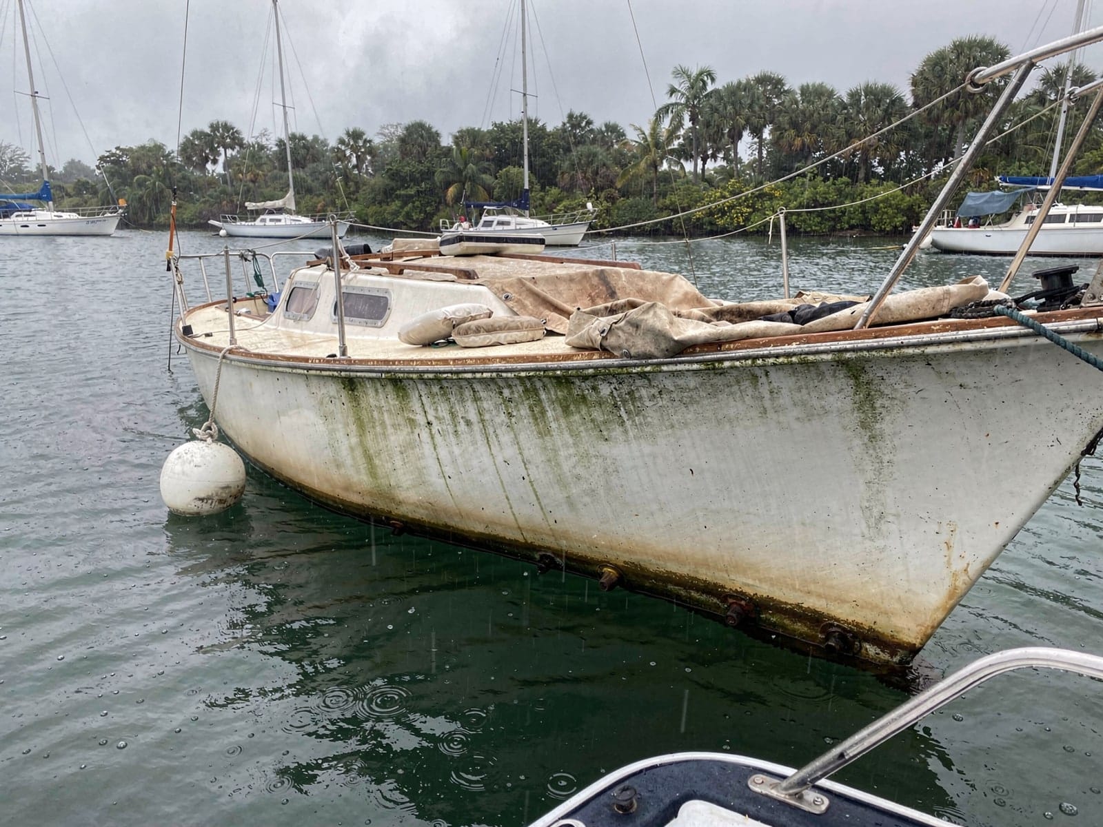 Sunken 25 ft O'Day 25 at its mooring in Winter Park, FL